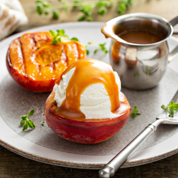 Grilled Peaches with Vanilla Ice Cream and Caramel Sauce