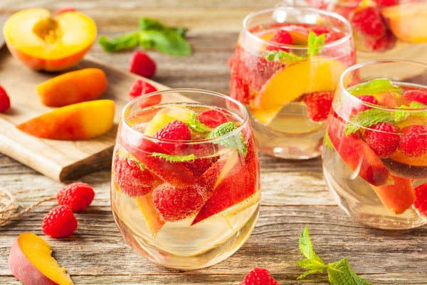 Sangria with Melon, Peaches & Cherries